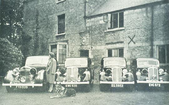 Cars outside Eastgate House circa 1944